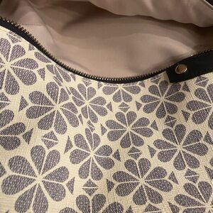 Kate Spade navy patterned backpack.